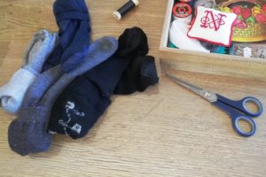 Chaussettes à repriser et accessoires de couture